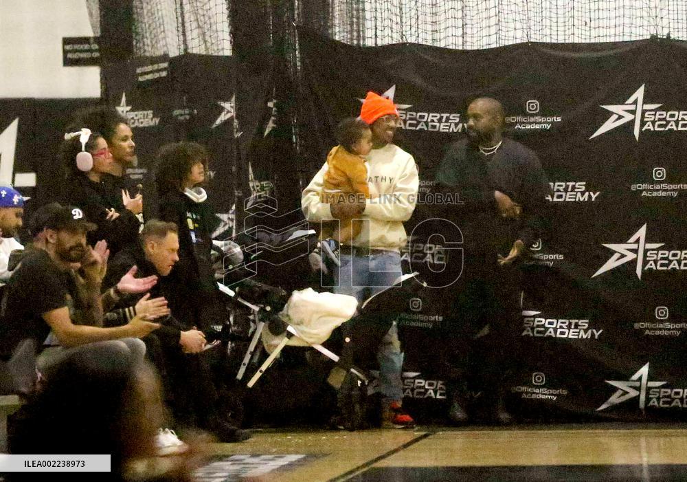 Kim Kardashian and Kanye West attend childrens basketball game - LA