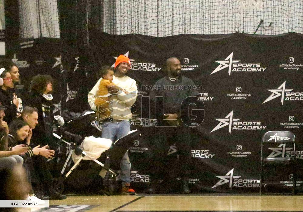Kim Kardashian and Kanye West attend childrens basketball game - LA