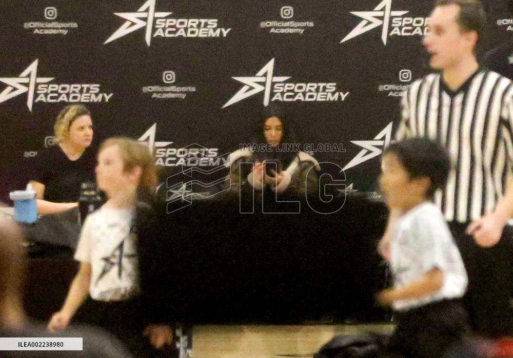 Kim Kardashian and Kanye West attend childrens basketball game - LA
