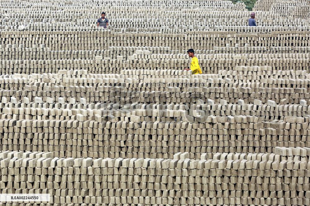 Laborers Work At A Bricks Field In Bangladesh