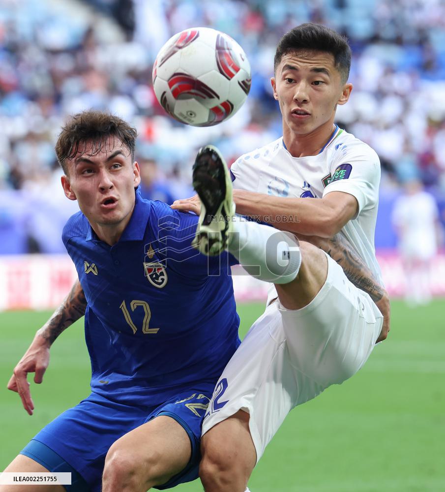 (SP)QATAR-DOHA-FOOTBALL-AFC ASIAN CUP-UZBEKISTAN VS THAILAND