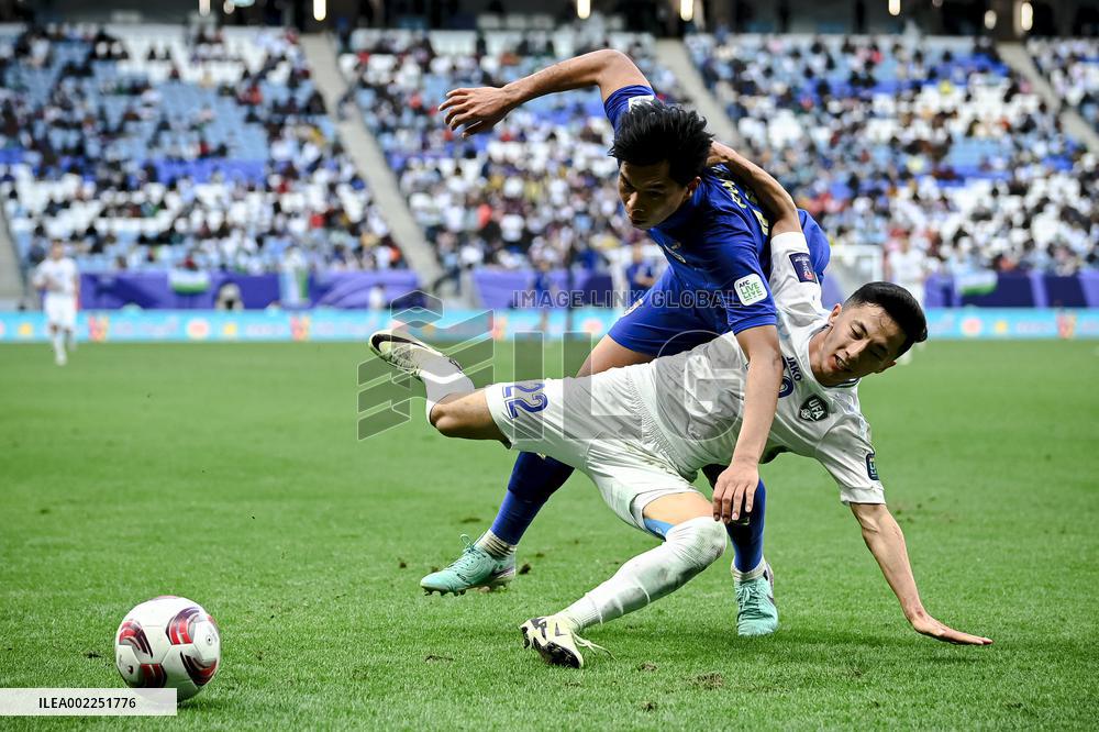 (SP)QATAR-DOHA-FOOTBALL-AFC ASIAN CUP-UZBEKISTAN VS THAILAND