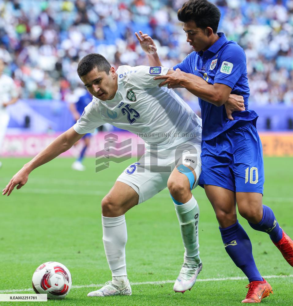 (SP)QATAR-DOHA-FOOTBALL-AFC ASIAN CUP-UZBEKISTAN VS THAILAND