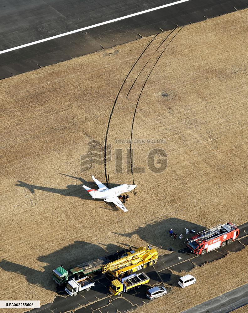 Small jet overshoots runway at Japanese airport