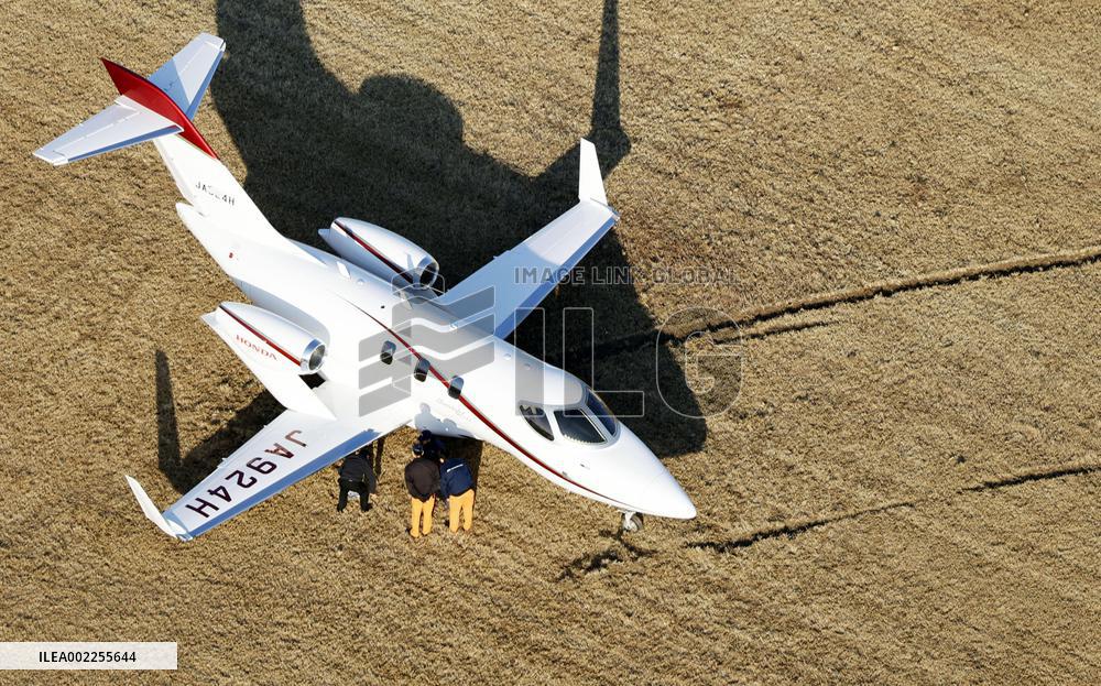 Small jet overshoots runway at Japanese airport