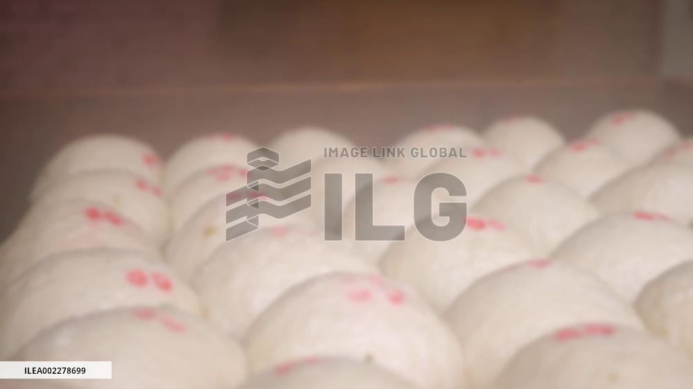 7-meter-high steamer set used in bun shop in China to meet New Year demand