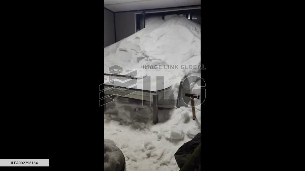 China: Man Digs Through Mounds Of Snow Inside House After Snowstorm In Hunan