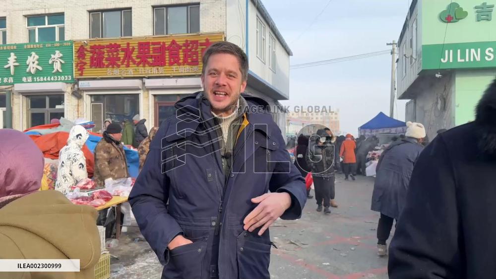 Touring rural market during Spring Festival with French chef