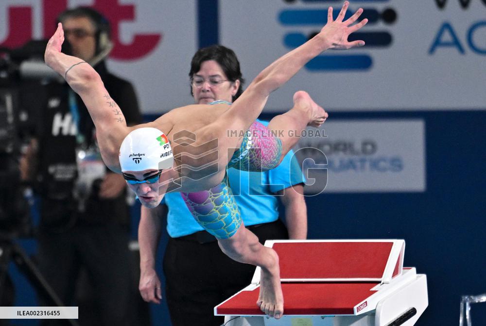 (SP)QATAR-DOHA-SWIMMING-WORLD AQUATICS CHAMPIONSHIPS-MEN'S 50M BUTTERFLY