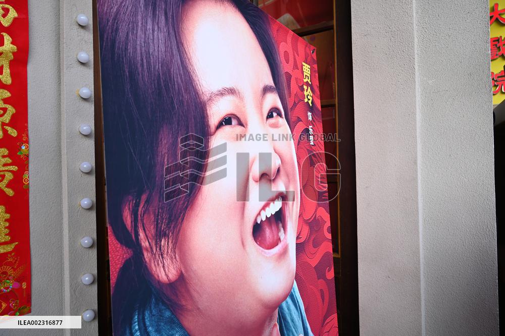 People Wait in Front of Movie Posters for the Lunar Year at A Cinema in Nanning