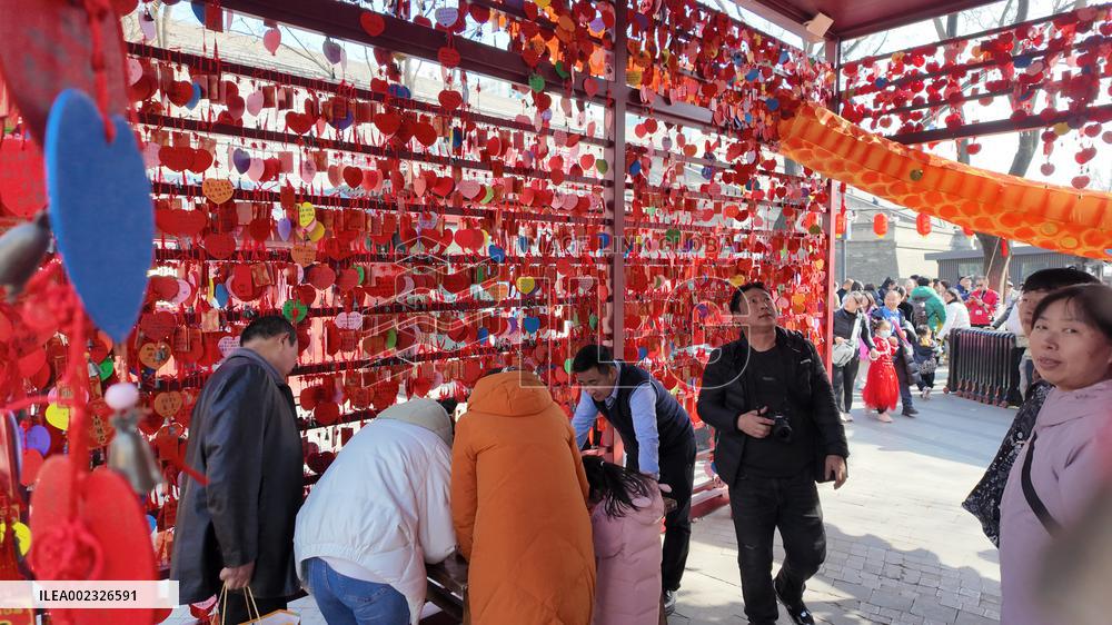 Tourists Visit A Blessing Wall in Xi'an