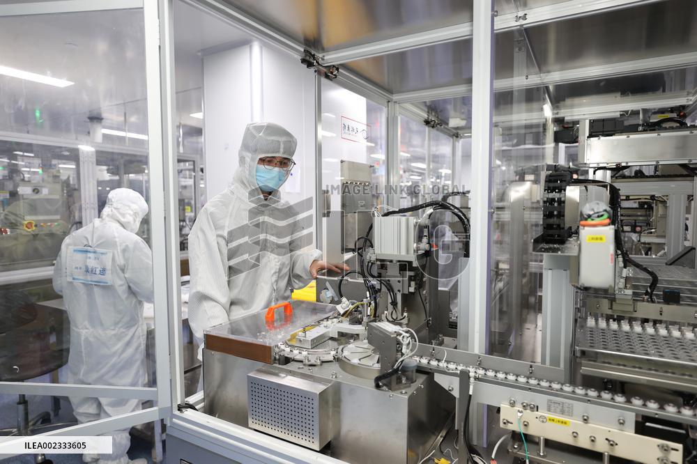 Workers Make Contact Lenses