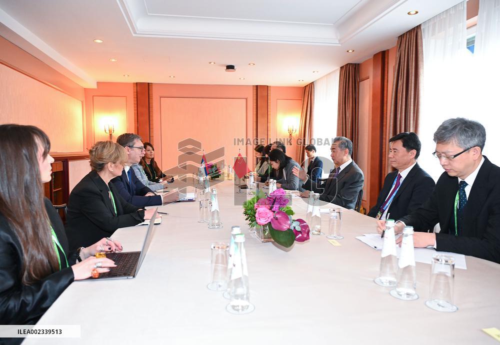GERMANY-MUNICH-CHINA-WANG YI-SERBIAN PRESIDENT-MEETING
