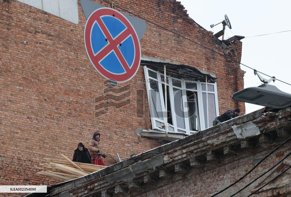 Utility workers repair consequences of Russian shelling in Kharkiv