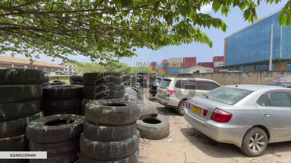 Tanzanian man earns living by making sandals from used tires