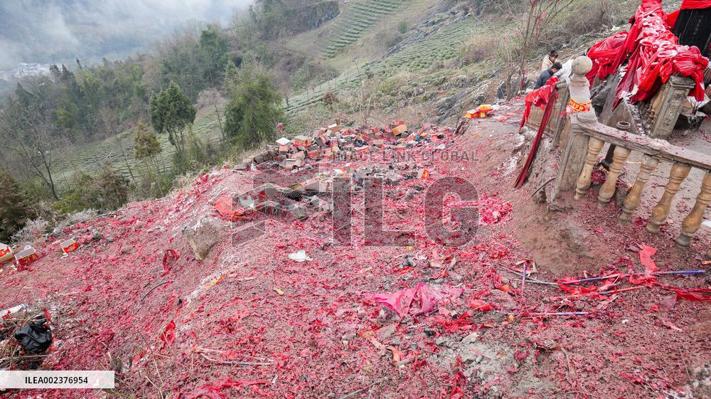 Pilgrims Worship Sacred Stone in Enshi