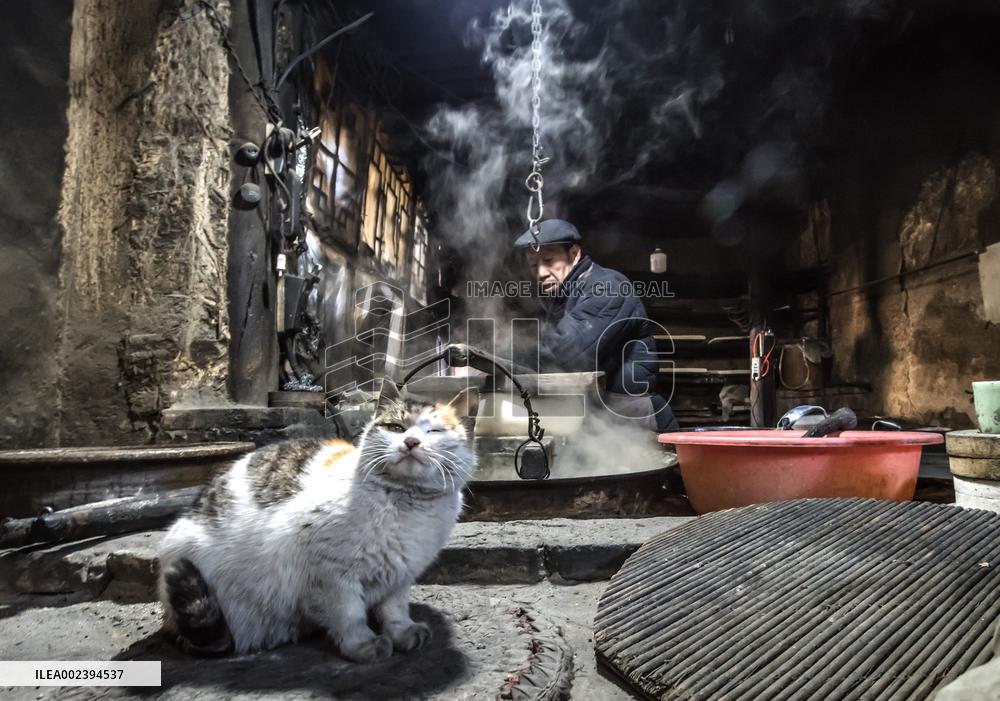 Craftsman make tofu in traditional ways in Hebei,China
