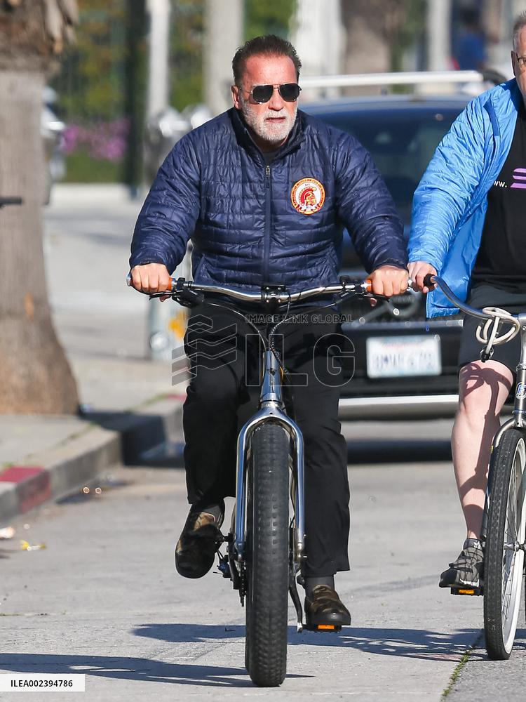 Arnold Schwarzenegger Out For A Bike Ride - LA