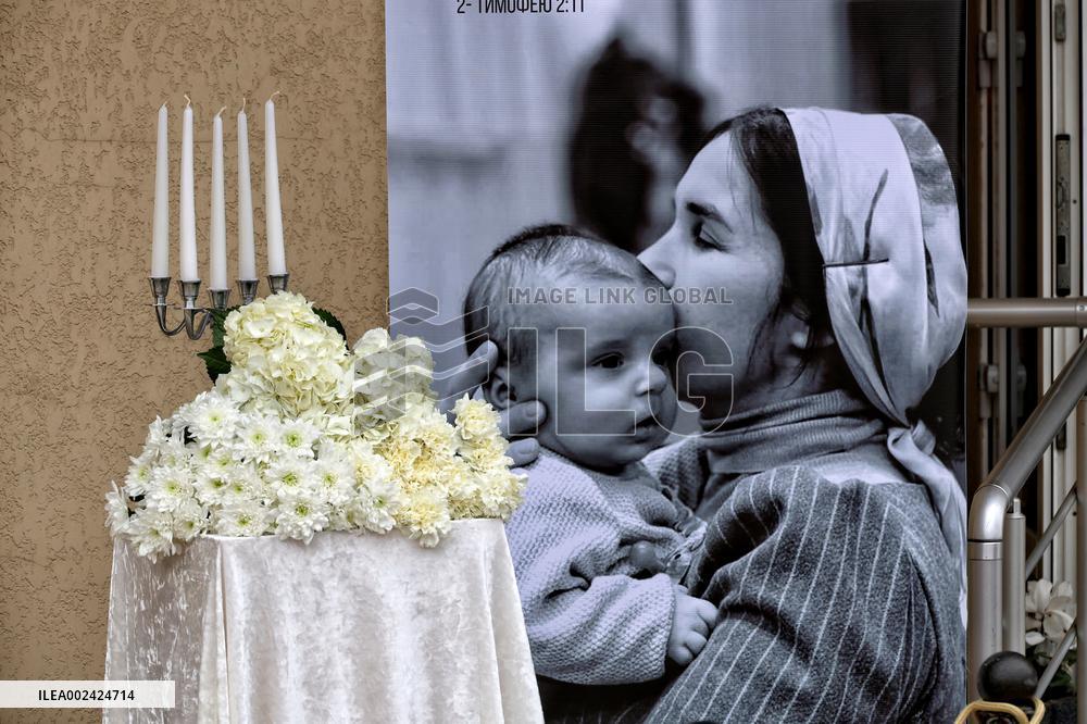 Memorial service for mother and 4mo baby killed in March 2 Russian drone attack on Odesa