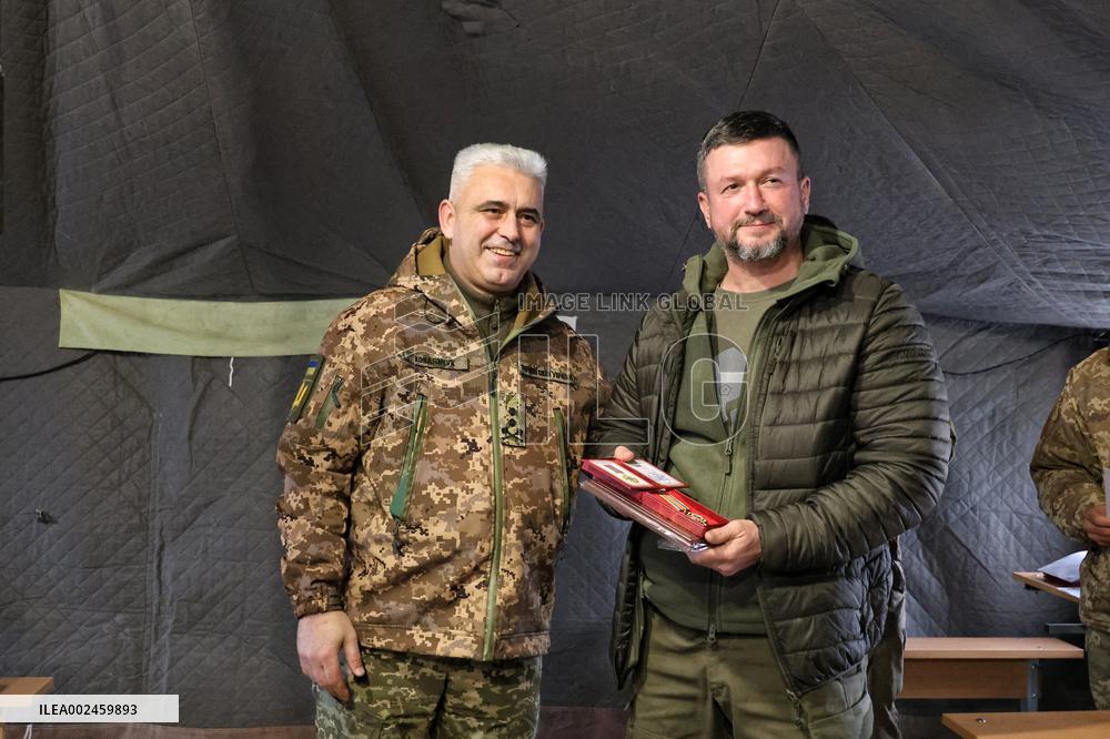 Volunteers hand over mobile baths and restored trophy vehicles to military in Odesa