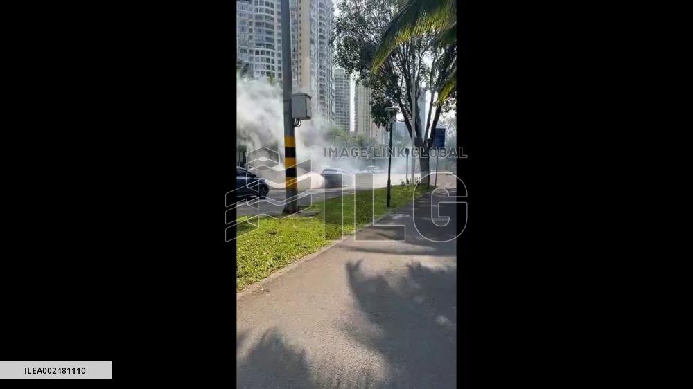 China: Fire Engulfs Electric Vehicle In Haikou, Hainan