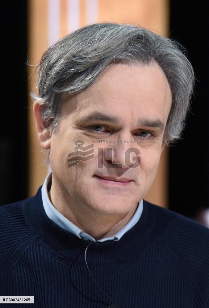 Charlie Hebdo Director Riss Appears On RMC/BFMTV - Paris