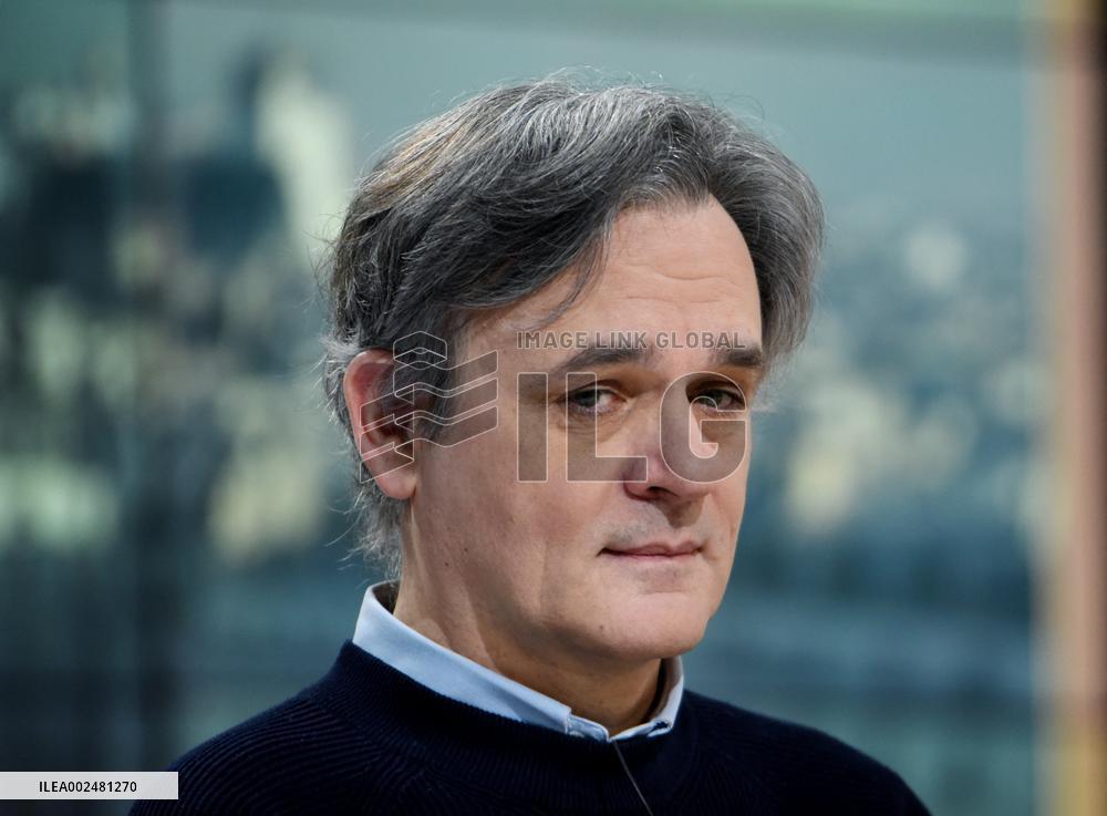 Charlie Hebdo Director Riss Appears On RMC/BFMTV - Paris