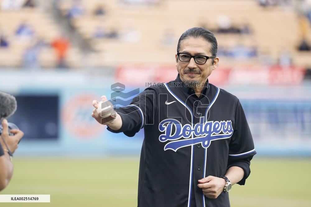 Japan actor Sanada tosses pitch at Dodger Stadium
