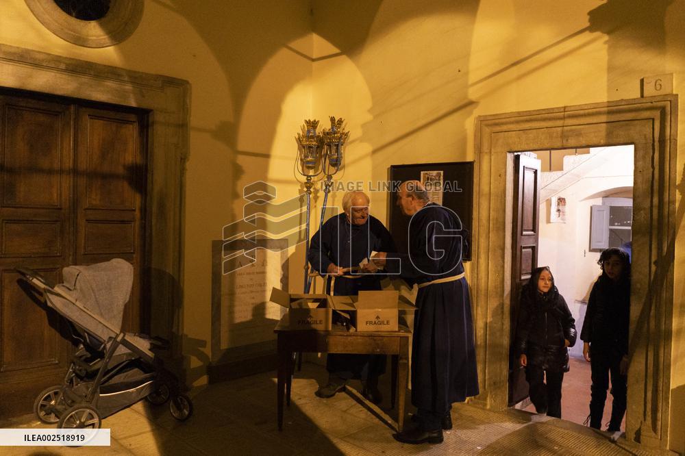 Hooded Penitents Parade In Tuscany