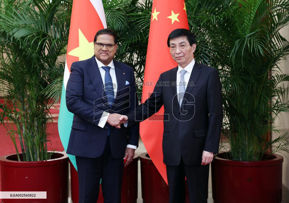 CHINA-BEIJING-WANG HUNING-SURINAME-PRESIDENT-MEETING (CN)