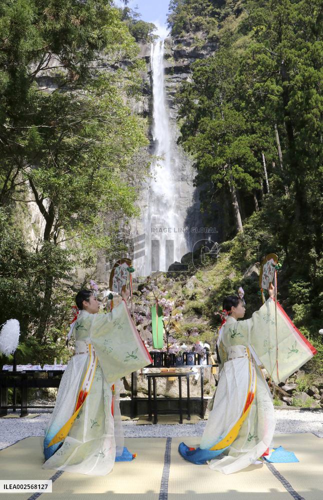 Ritual at waterfall in western Japan