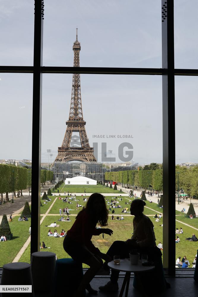 People enjoying the sun in Paris
