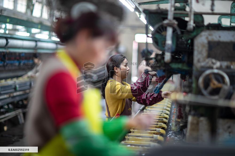 a Mulberry Silk Processing Workshop in Xinghua