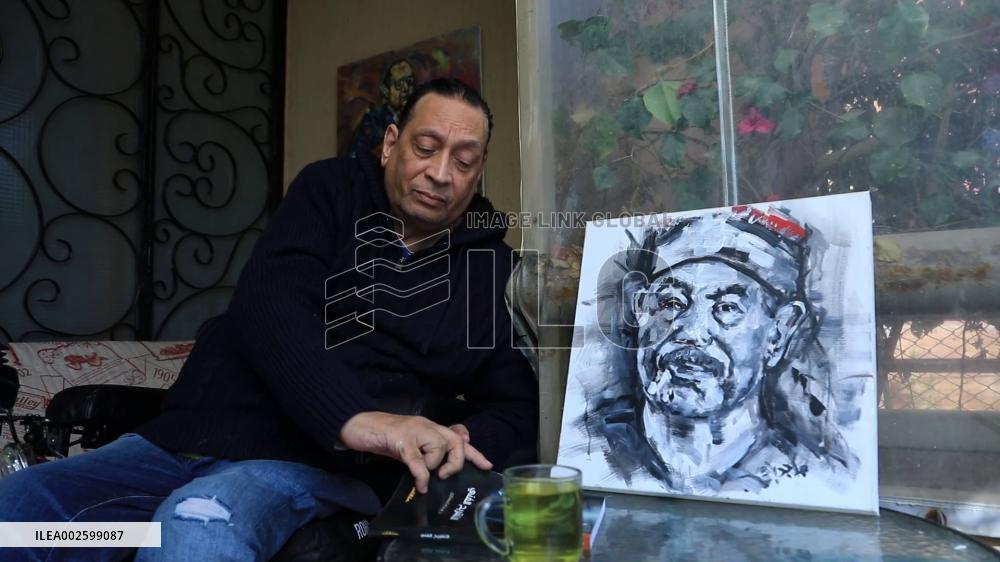 Physically challenged artist in Egypt triumphs over quadriplegia through art