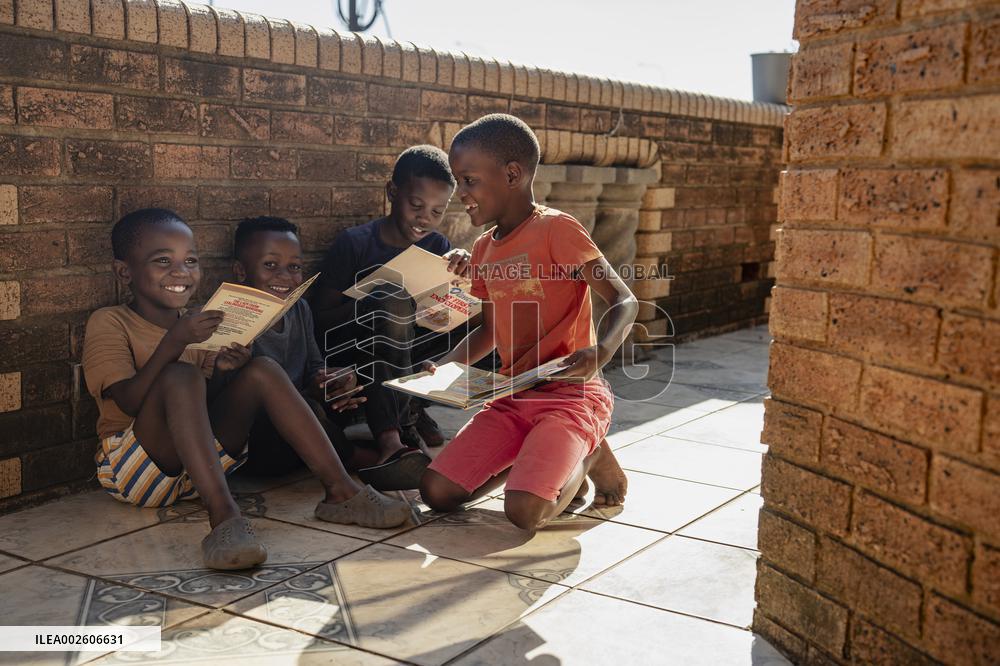 SOUTH AFRICA-JOHANNESBURG-SOWETO-BOOK CLUB-WORLD BOOK DAY