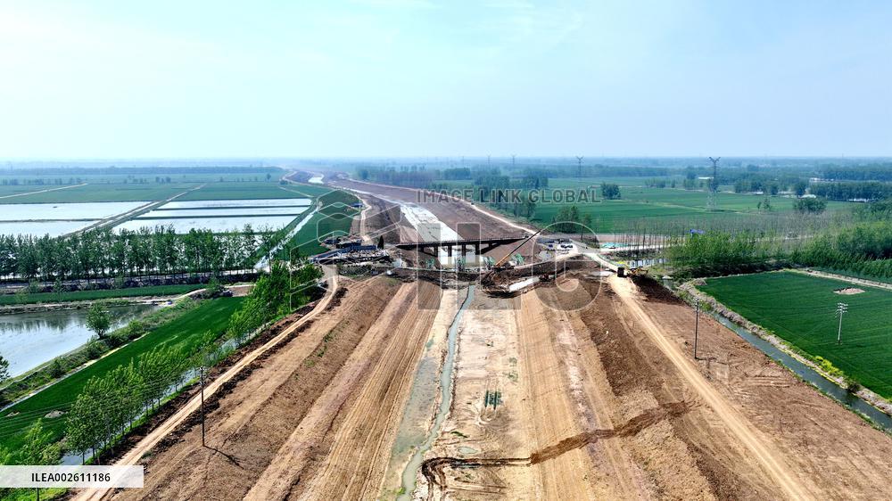 Workers Reinforce Embankments in Suqian