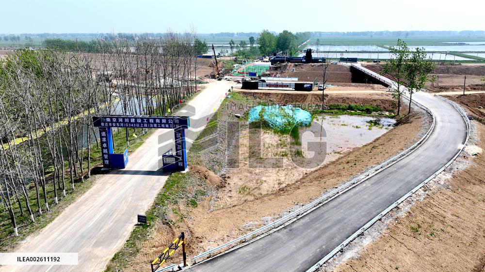 Workers Reinforce Embankments in Suqian