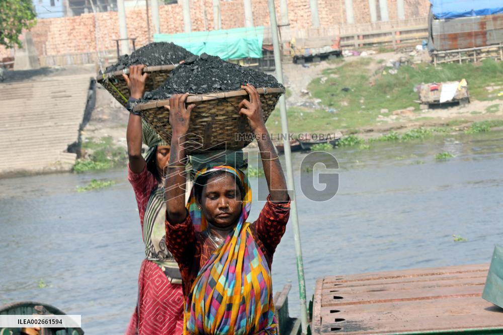 Labourers Are Unloading Coal From A Cargo Ship - Bangladesh