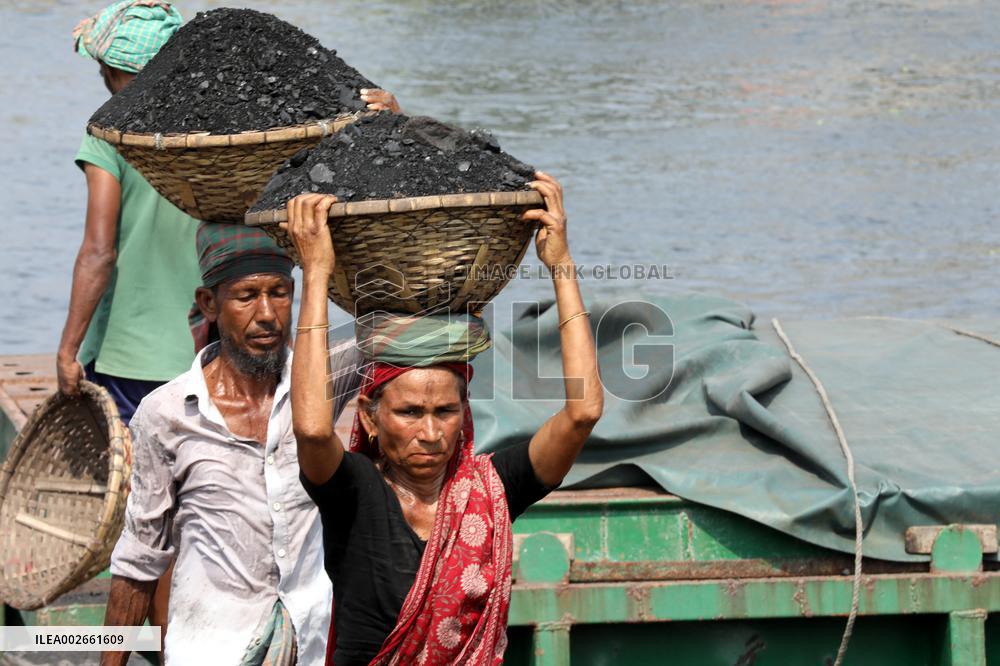 Labourers Are Unloading Coal From A Cargo Ship - Bangladesh