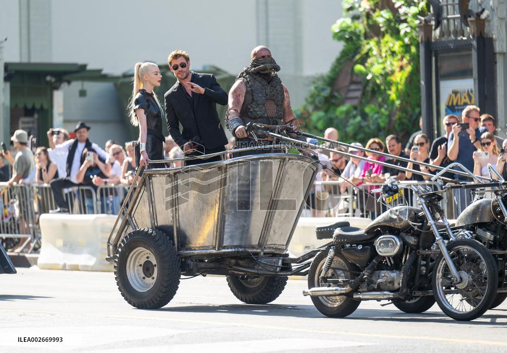 Anya Taylor-Joy and Chris Hemsworth Arrive At Jimmy Kimmel On Mad Max Carriage - LA
