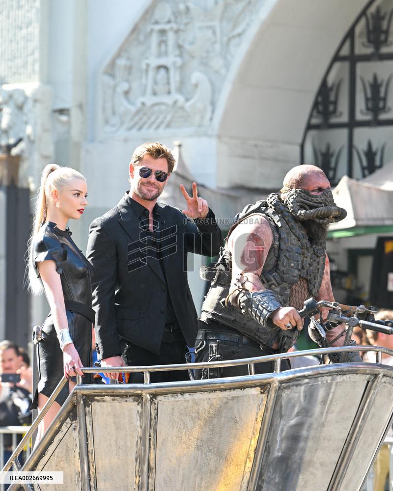 Anya Taylor-Joy and Chris Hemsworth Arrive At Jimmy Kimmel On Mad Max Carriage - LA