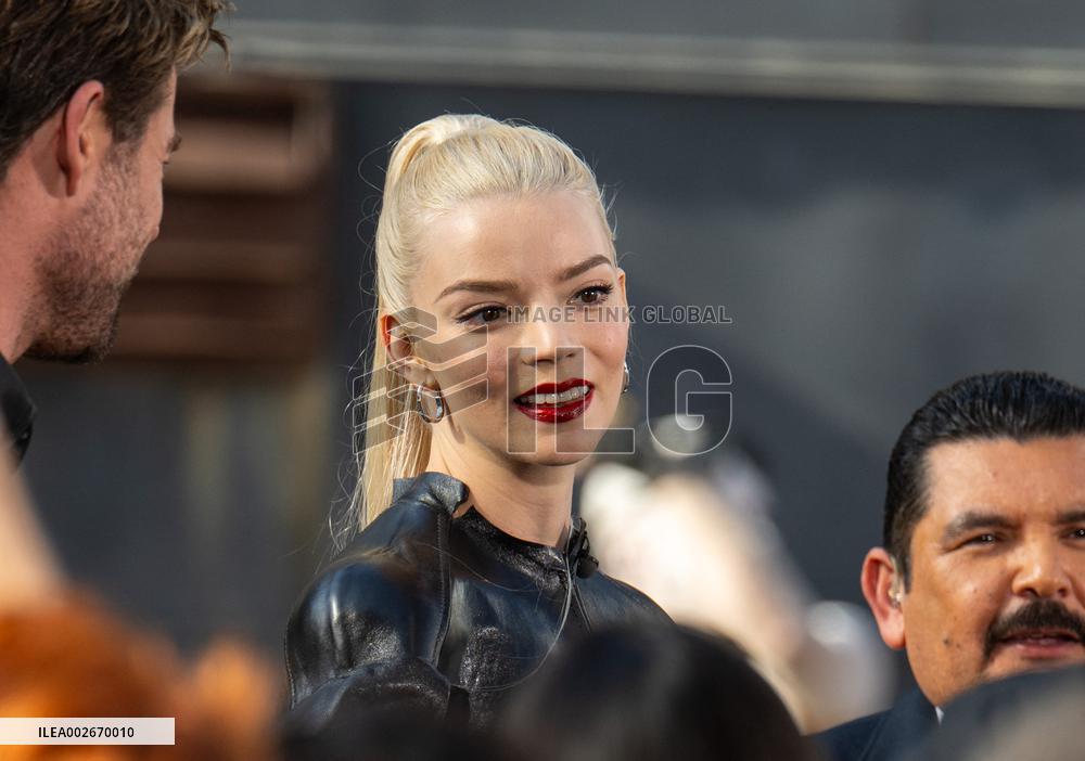 Anya Taylor-Joy and Chris Hemsworth Arrive At Jimmy Kimmel On Mad Max Carriage - LA