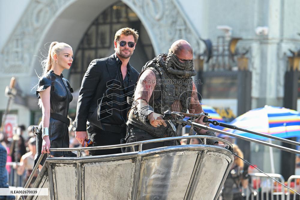 Anya Taylor-Joy and Chris Hemsworth Arrive At Jimmy Kimmel On Mad Max Carriage - LA