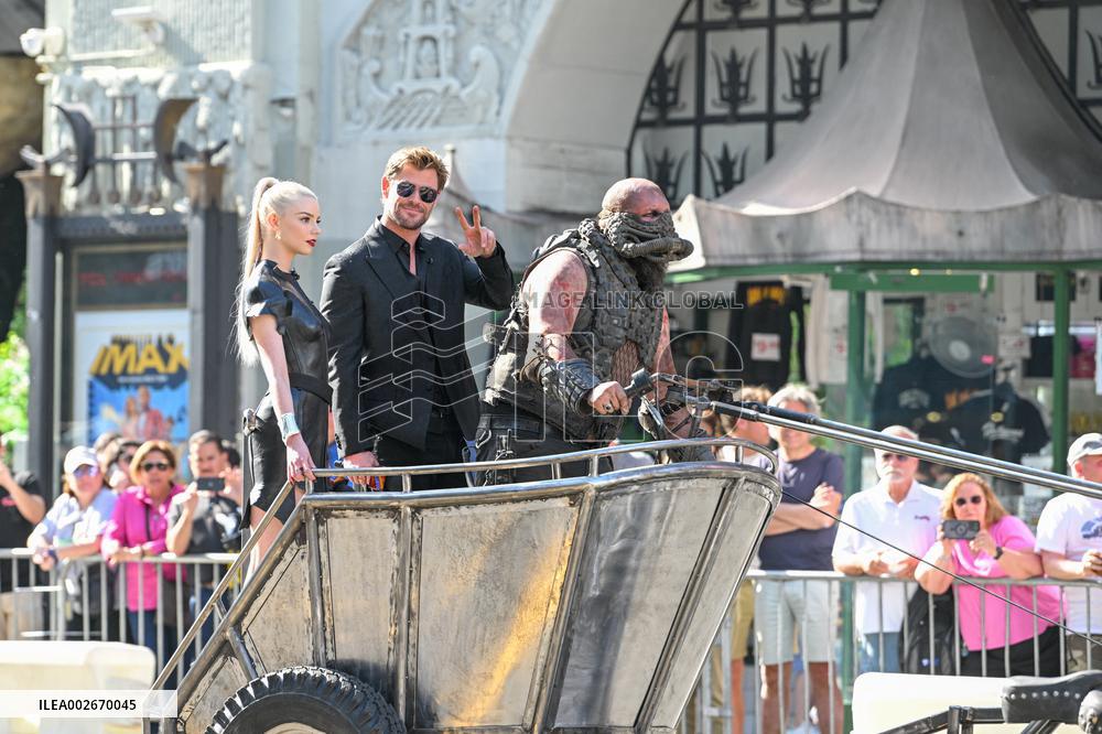 Anya Taylor-Joy and Chris Hemsworth Arrive At Jimmy Kimmel On Mad Max Carriage - LA
