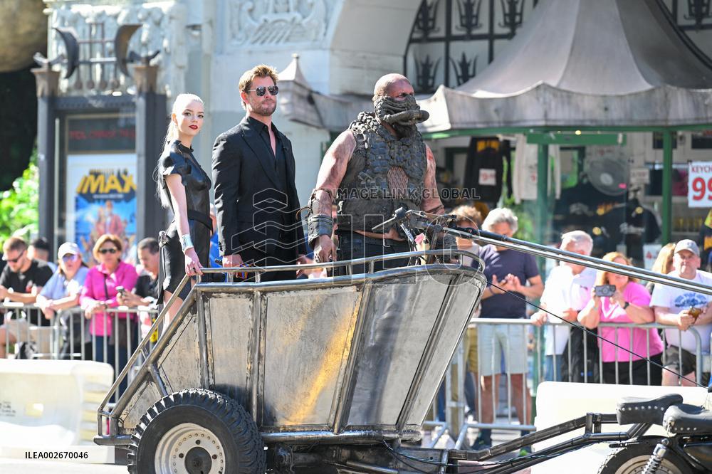 Anya Taylor-Joy and Chris Hemsworth Arrive At Jimmy Kimmel On Mad Max Carriage - LA
