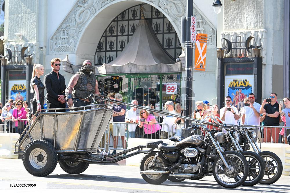 Anya Taylor-Joy and Chris Hemsworth Arrive At Jimmy Kimmel On Mad Max Carriage - LA
