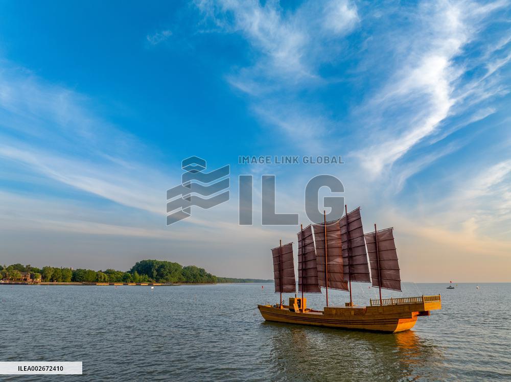 Sailboats in The Sunset Glow in Huai 'an