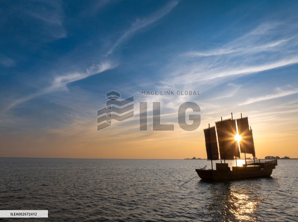 Sailboats in The Sunset Glow in Huai 'an