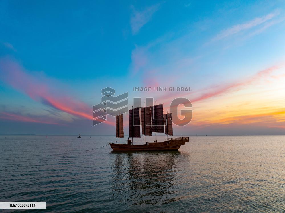 Sailboats in The Sunset Glow in Huai 'an