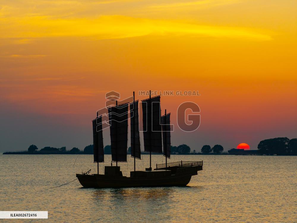 Sailboats in The Sunset Glow in Huai 'an